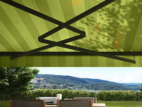 markilux 1600 mit gruenem Tuch, Gestell in grau. Fokus auf den Stretch Gelenkarm